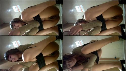 Girl_urinating_and_posing_for_photos.jpg